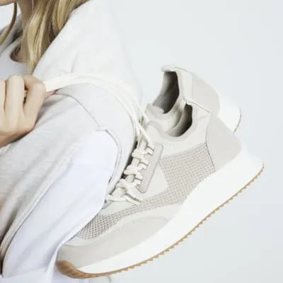 Beige knit lace up trainers sold by River Island