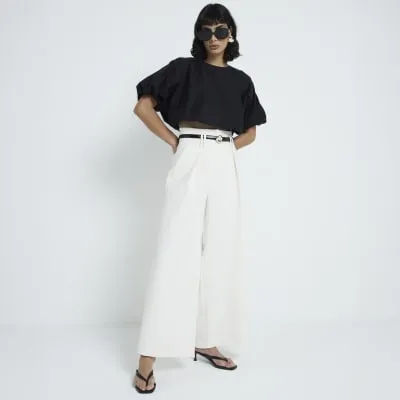 Cream premium High Waisted Wide Leg Trousers sold by River Island