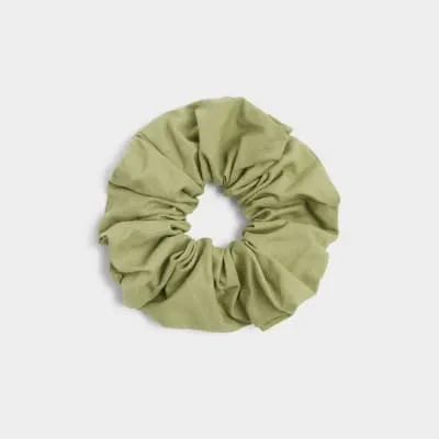 Green linen oversized scrunchie sold by River Island