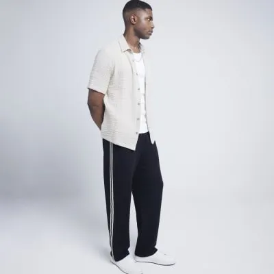 Beige regular fit textured short sleeve shirt sold by River Island