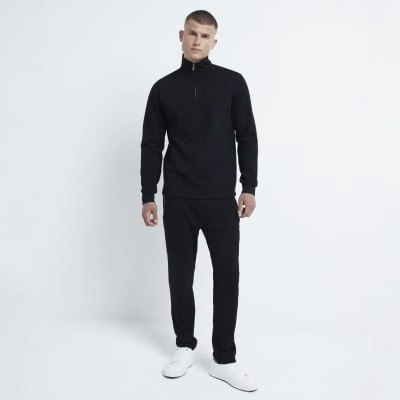 Black slim fit textured half zip sweatshirt sold by River Island