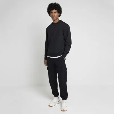 Black regular fit quilted sweatshirt sold by River Island