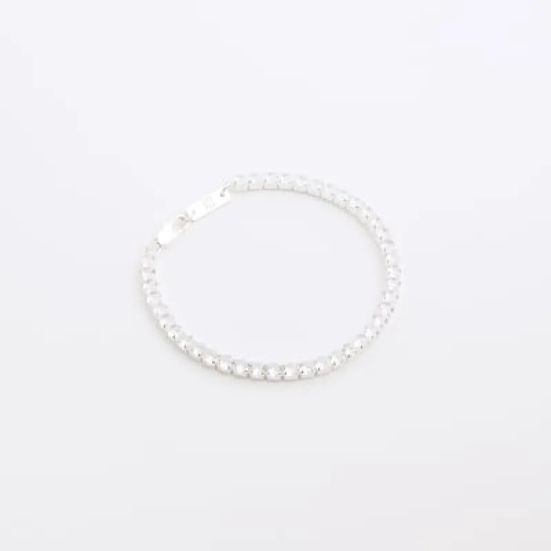 Silver colour diamante bracelet sold by River Island