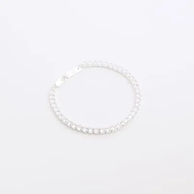 Silver colour diamante bracelet sold by River Island