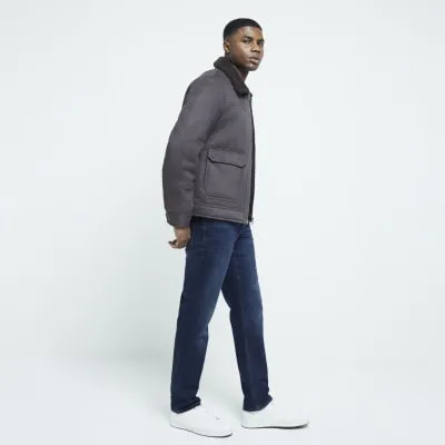 Brown regular fit faux fur shearling jacket sold by River Island