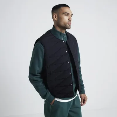 Black regular fit quilted gilet sold by River Island