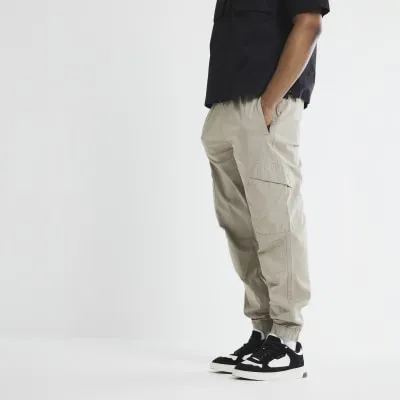 Stone Regular Fit Cuffed Cargo Trousers sold by River Island