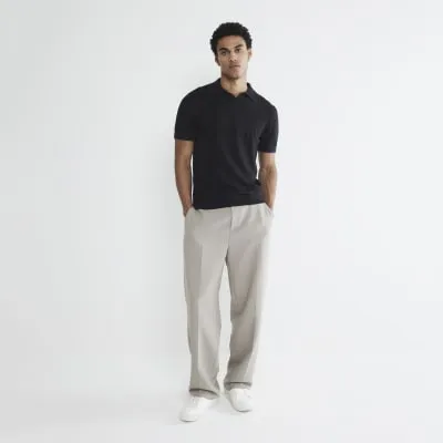 Black Asymmetric Open Collar Polo Shirt sold by River Island