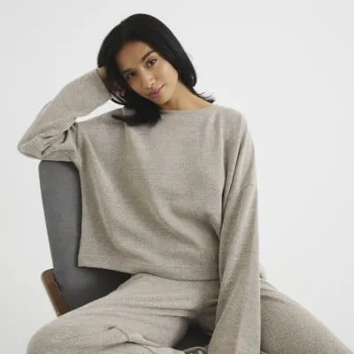 Petite Gold Long Sleeved Top sold by River Island