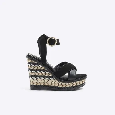Black crossed wedge espadrille sandals sold by River Island