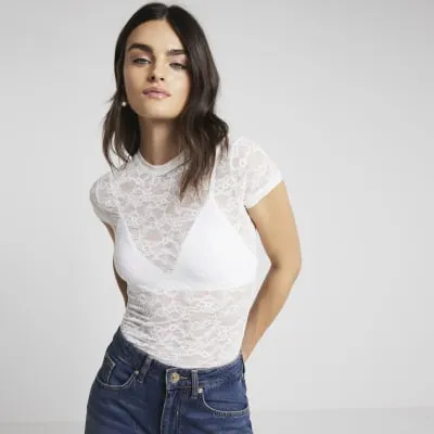Cream sheer lace short sleeve t-shirt sold by River Island