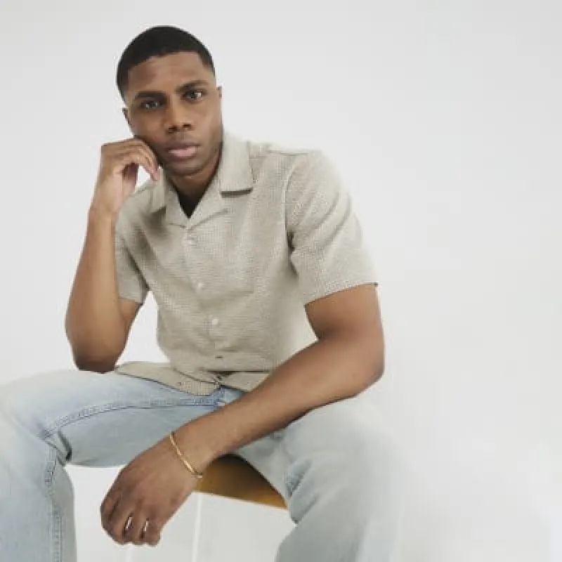 Stone Regular Fit Jacquard Polo Shirt sold by River Island