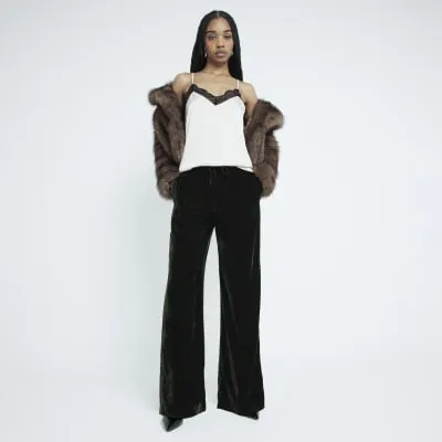 Green Velvet Wide Leg Trousers sold by River Island