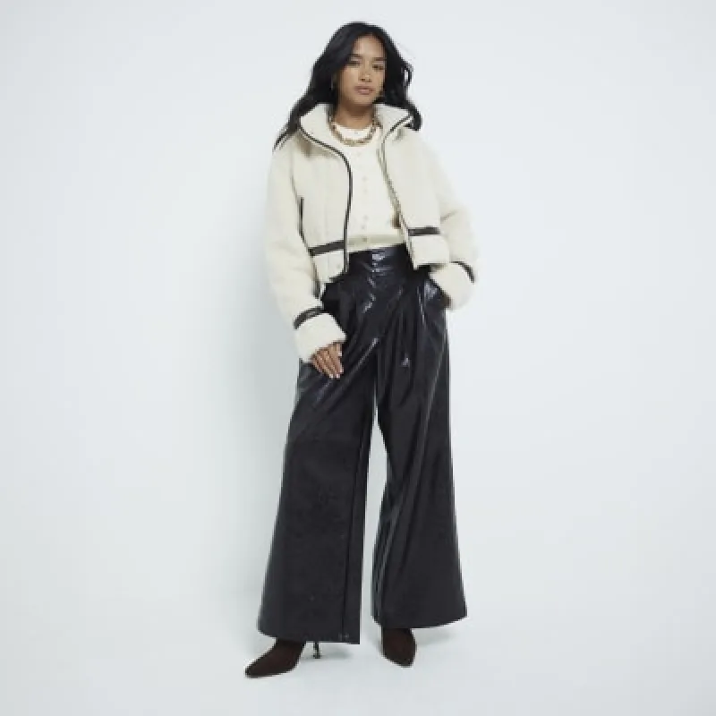 Petite Cream Borg Cropped Jacket sold by River Island