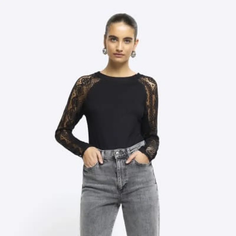 Black rib lace long sleeve top sold by River Island