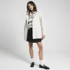 Stone hooded longline rain coat sold by River Island