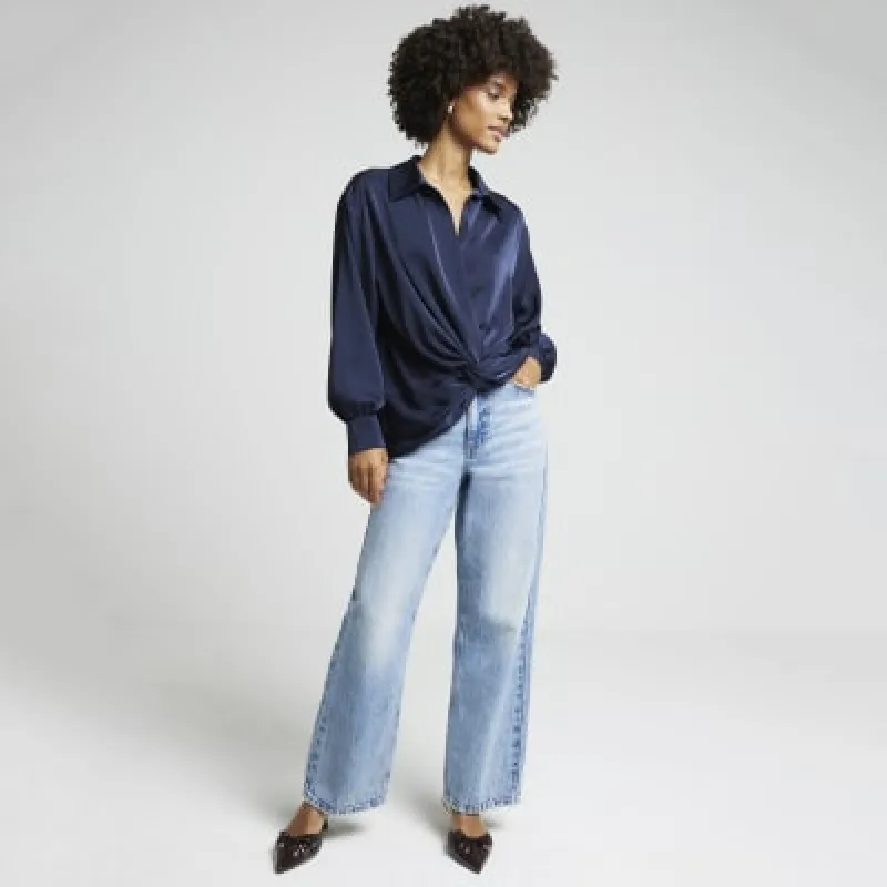 Navy satin front knot blouse sold by River Island