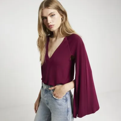 Red Flute Sleeve Bodysuit sold by River Island