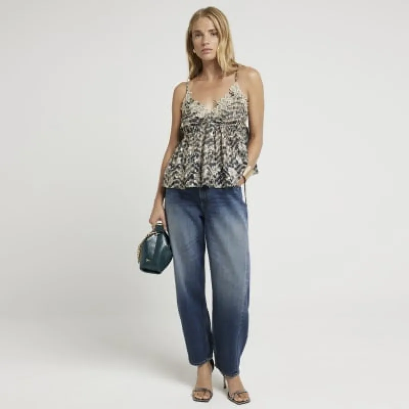 Green embellished floral cami top sold by River Island