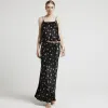 Black satin floral cowl neck cami top sold by River Island