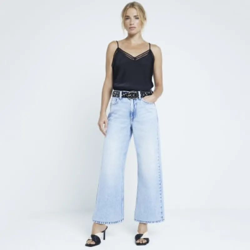 Black cutwork trim cami top sold by River Island