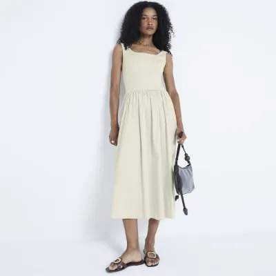 Stone hybrid skater midi dress sold by River Island
