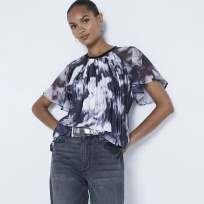 Black plisse abstract blouse sold by River Island