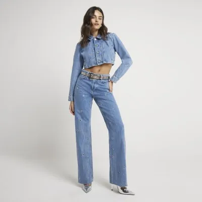 Blue relaxed straight eyelet jeans sold by River Island