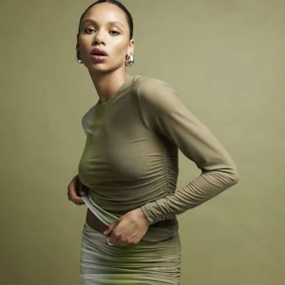 Green mesh ombre ruched long sleeve top sold by River Island