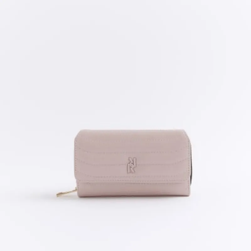 Pink quilted purse sold by River Island