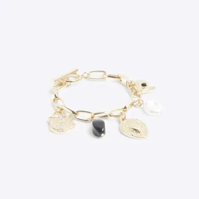 Gold charm chain bracelet sold by River Island