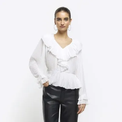 White plisse frill blouse sold by River Island