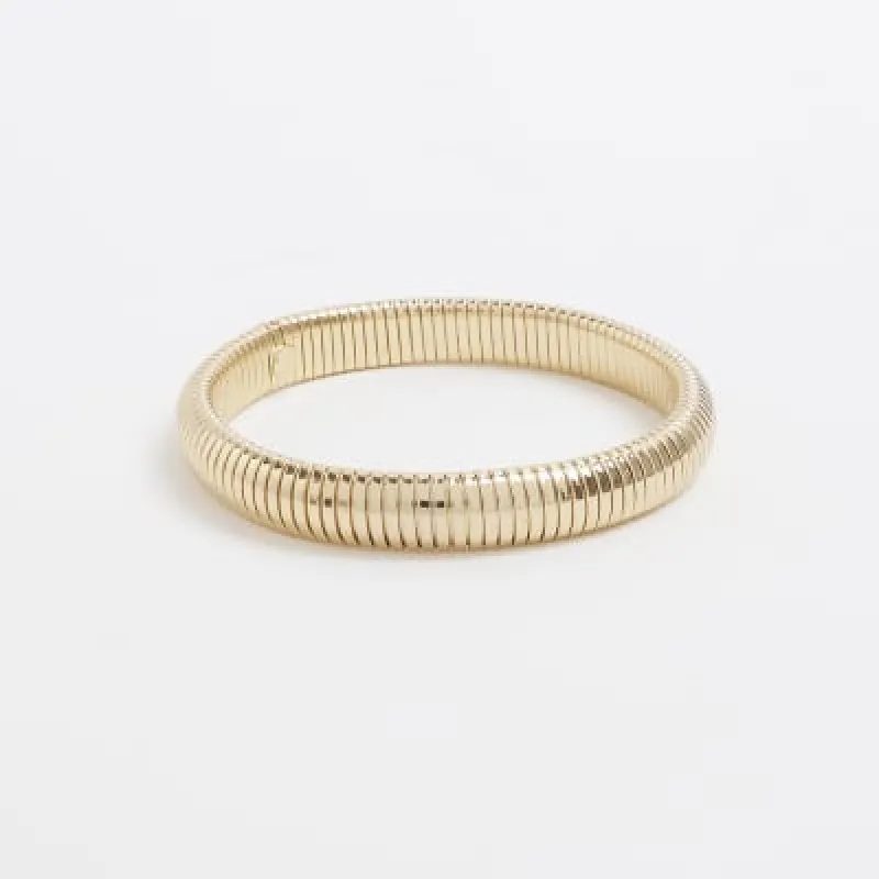Gold watch strap bracelet sold by River Island