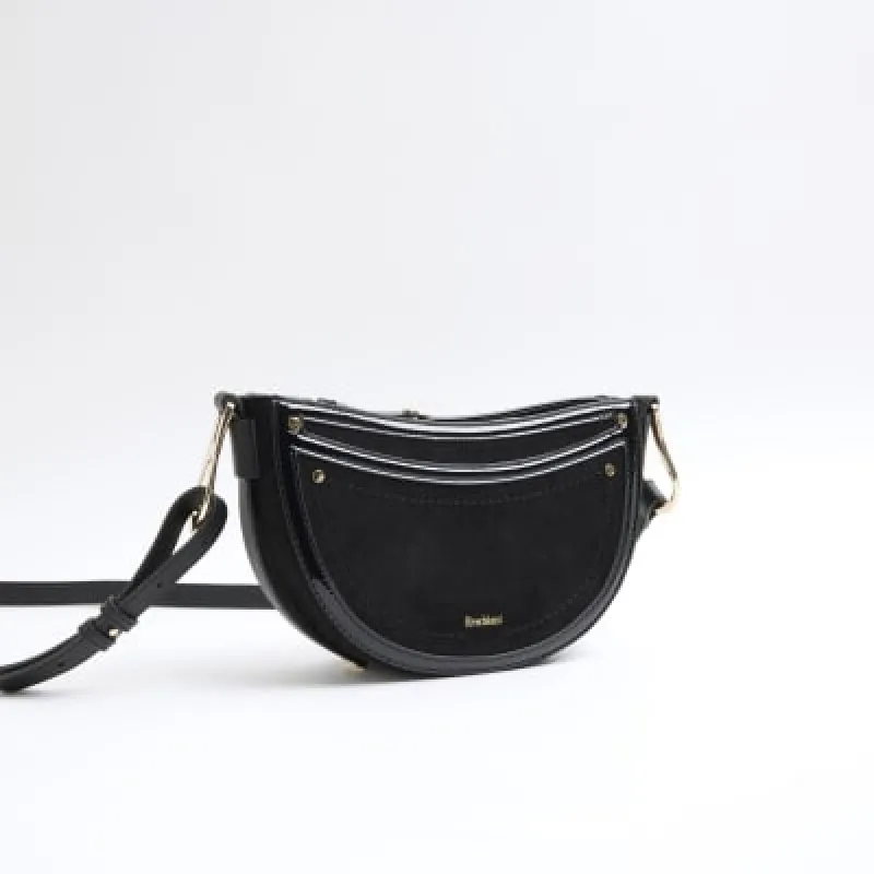 Black suedette scoop cross body bag sold by River Island
