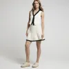 Cream knit pleated mini skirt sold by River Island