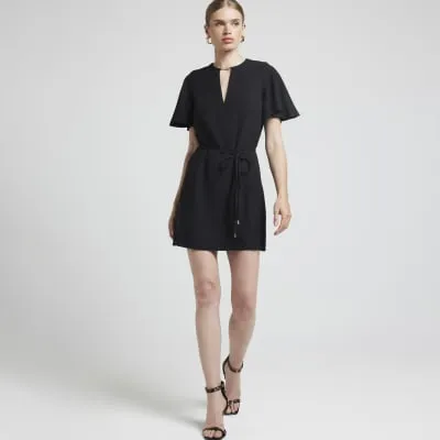 Black cut out flute sleeve shift mini dress sold by River Island