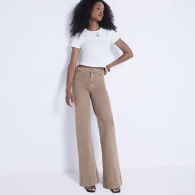Beige High Waisted wide leg jeans sold by River Island