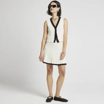 Cream knitted waistcoat sold by River Island