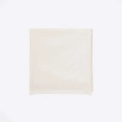 Cream metallic monogram lightweight scarf sold by River Island