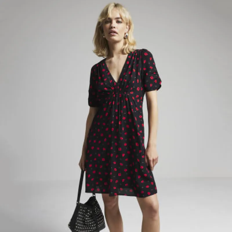 Black floral skater mini dress sold by River Island