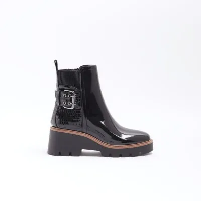 Black Patent buckle detail chelsea boots sold by River Island