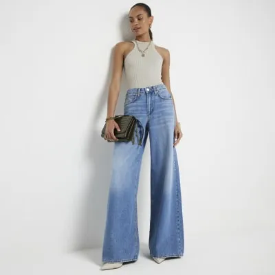 Blue mid rise elastic back palazzo jeans sold by River Island