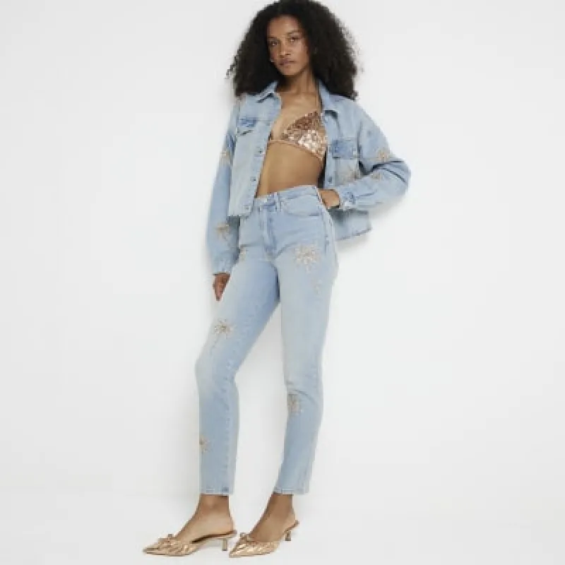 Blue slim straight fit embellished jeans sold by River Island