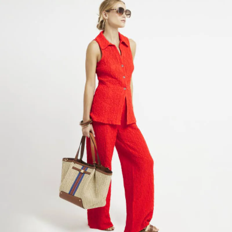Red textured sleeveless shirt sold by River Island