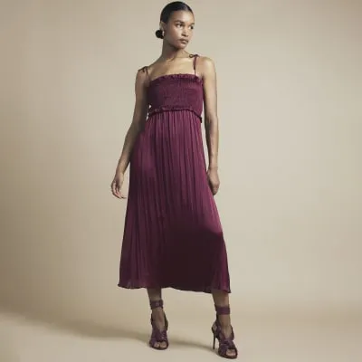 Red satin shirred slip midi dress sold by River Island