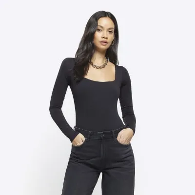 Black long sleeve bodysuit sold by River Island