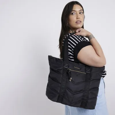 Black quilted webbing shopper bag sold by River Island