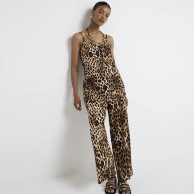 Brown leopard print sleeveless jumpsuit sold by River Island