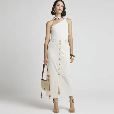 Cream linen blend button up maxi skirt sold by River Island