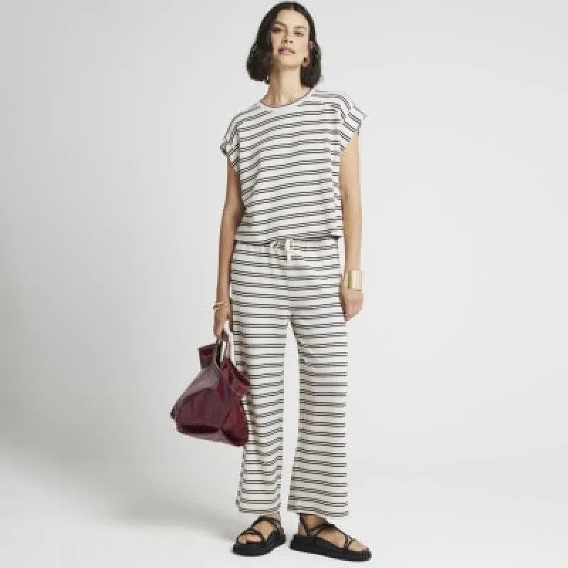 Cream crochet stripe roll sleeve t-shirt sold by River Island